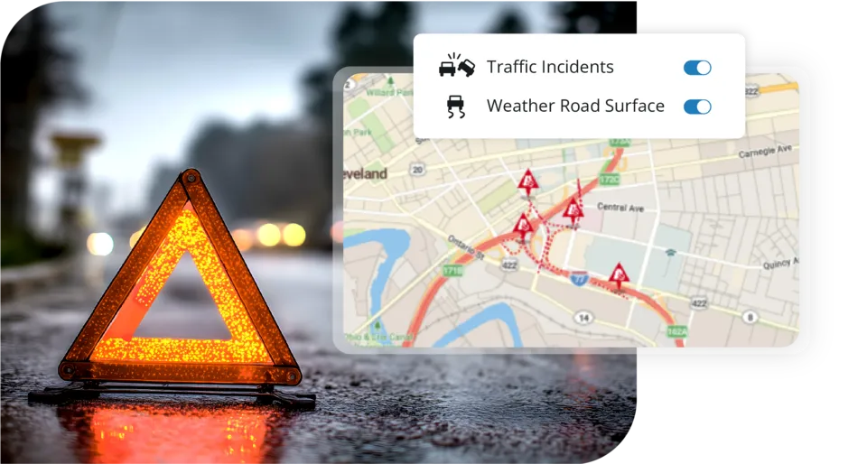 Illuminated orange warning triangle on a wet road, overlaid with a route map interface highlighting traffic incidents and weather road surface toggles.