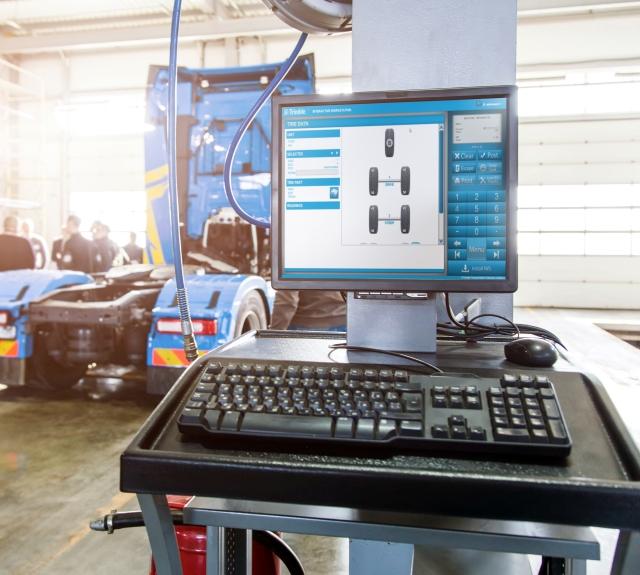 TMT Fleet Maintenance at a workstation showing tire details