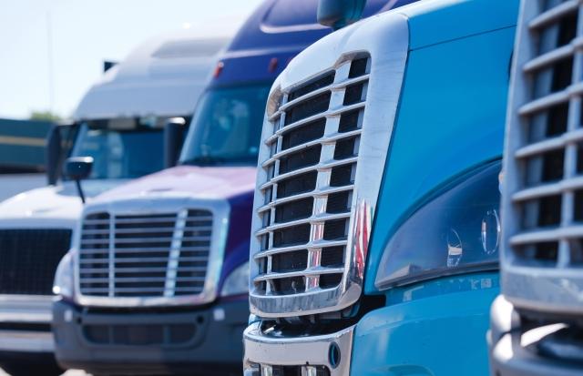 Row of semi truck grills