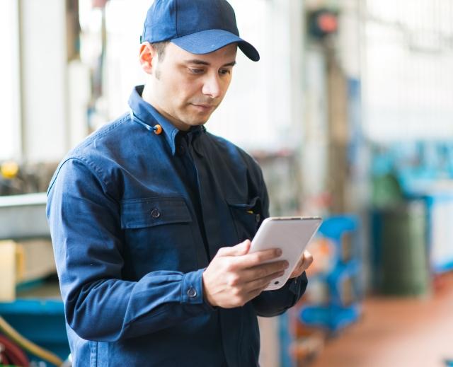 mechanic with tablet