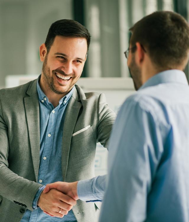 partners shaking hand during business agreement