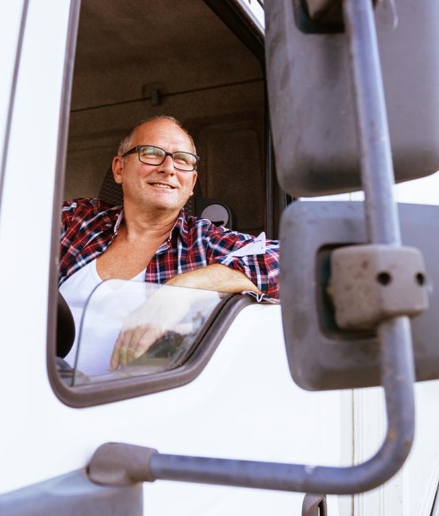 truck driver smiling out of window
