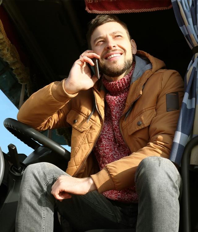 truck driver sitting in cab