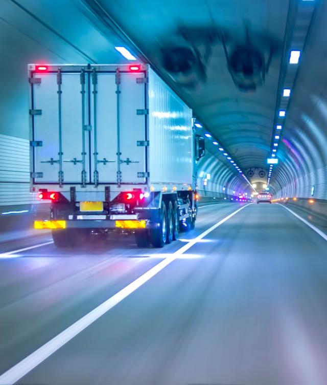 Truck on Move through Tunnel