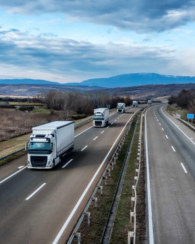 Trucks driving on a highway