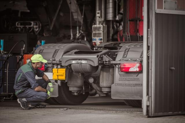 Mechanic working on truck maintenance